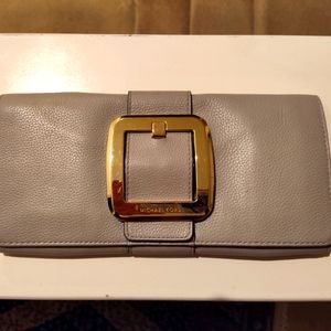 GREAT MICHAEL KORS BUCKLE LEATHER CLUTCH